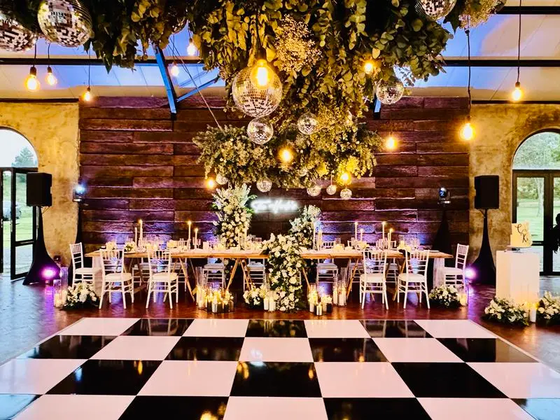 Netherwood Farm reception with a chequered dancefloor below the head table