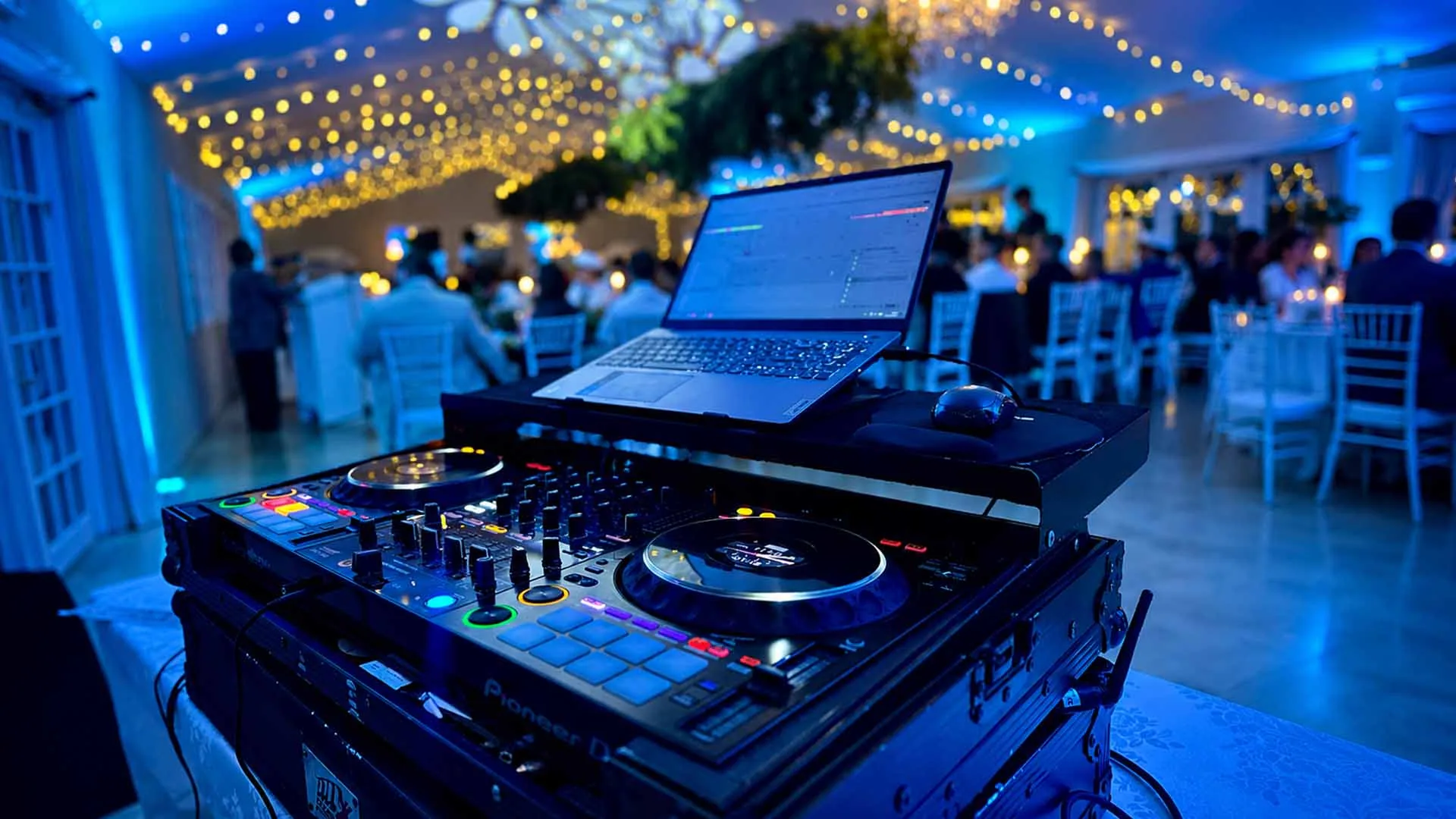 DJ decks and mixer lit in red at a KwaZulu-Natal wedding reception
