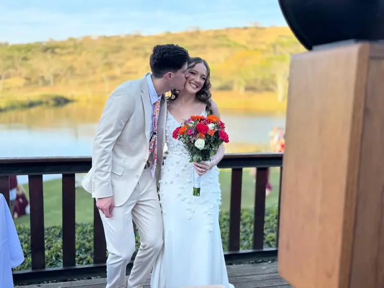 Bride and groom on a deck overlooking the KZN Midlands
