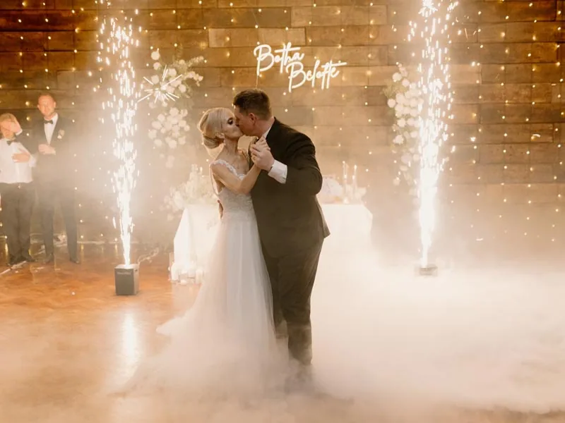 Cold spark fountain effects framing a first dance at a KZN Midlands wedding