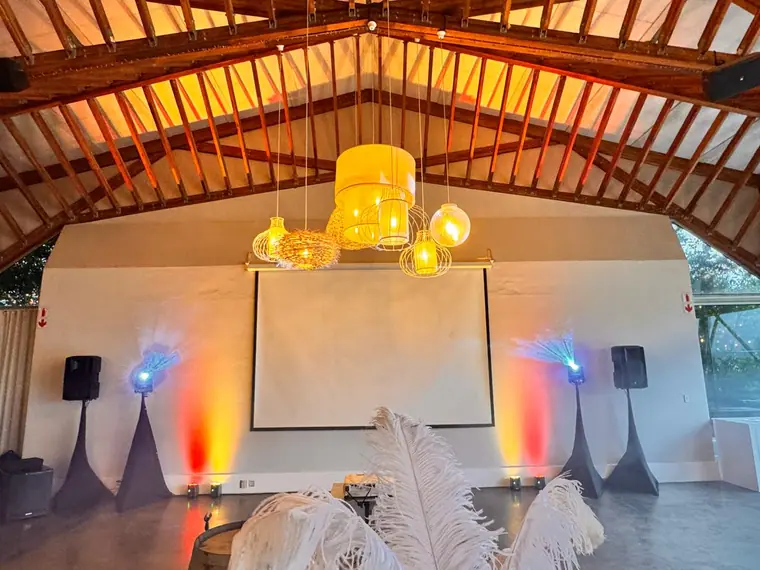 Venue uplighting and PA rigged before guests arrive at Brahman Hills