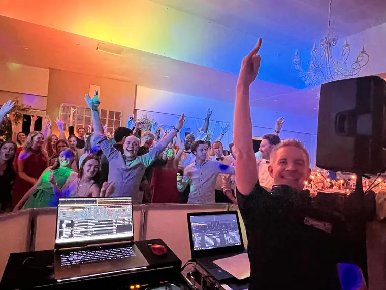 DJ Jarryd Sunkel behind the decks with the floor full at Fordoun