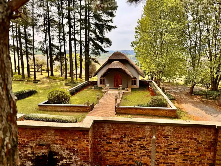 The thatched chapel among the pines at Granny Mouse