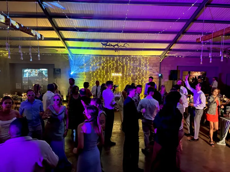 Packed dancefloor under marquee lighting at a Haycroft Farm wedding