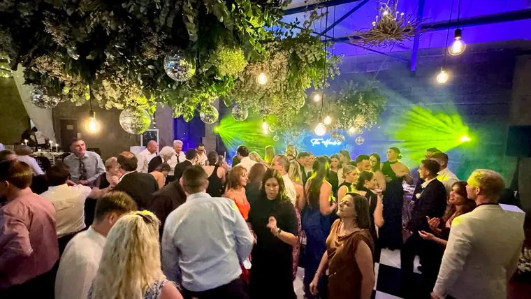 Disco balls and beam lighting over the dancefloor at Netherwood Farm