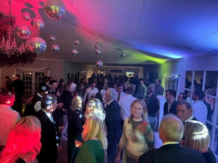 Guests dancing under disco balls at Providence Country Estate