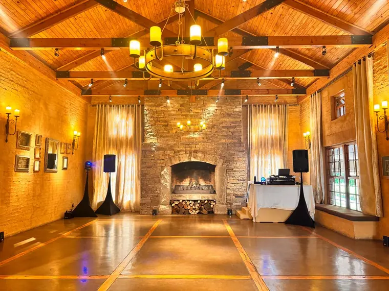 The sandstone hall and fireplace before the reception at The Gallery
