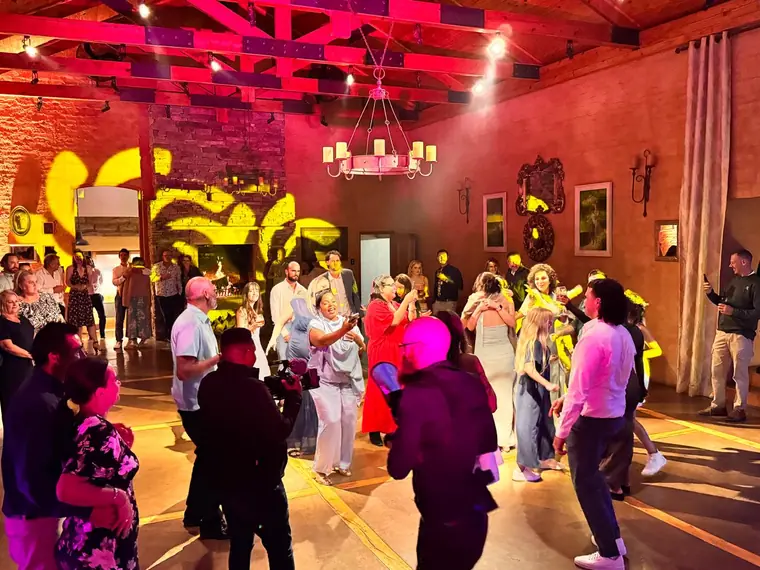 Dancing under the chandelier in the sandstone hall at The Gallery