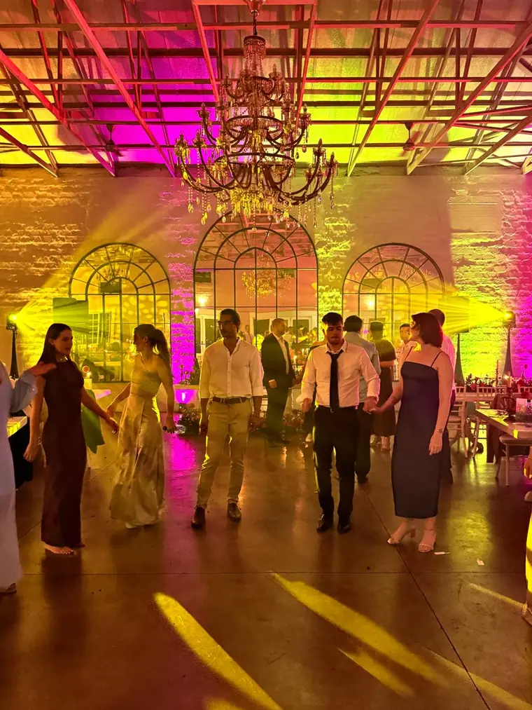 Warm and pink lighting over the dancefloor at The Groves