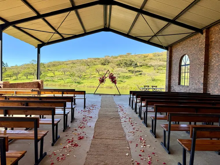 The open-sided chapel looking over the dam at Wingrove Valley