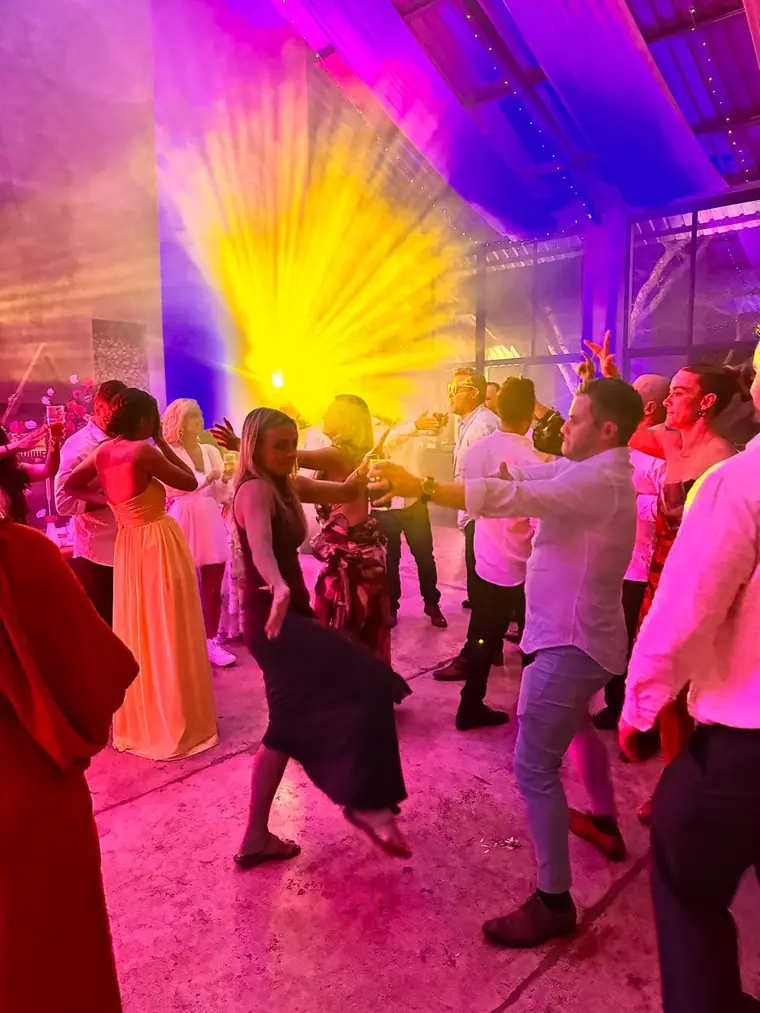 Beam lighting over a packed dancefloor at Wingrove Valley